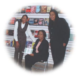 Nurturing The Garden of Joy:  Provocative Essays on Relationships by Claudette J. Spence - First Author to sign at C&B Books Grand Opening
as Carol Rogers, CEO & Lynn Williams, Manager look on.